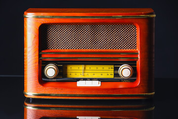 Retro radio receiver on dark background