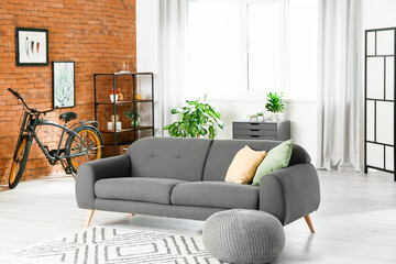 Interior of stylish living room with bicycle