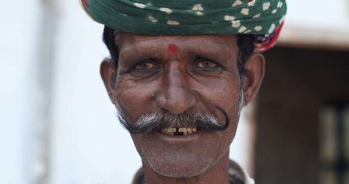 Closeup Shot Of An Senior South Asian Male In Traditional Indian Clothing