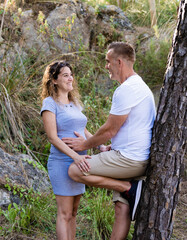 Young couple celebrating pregnancy