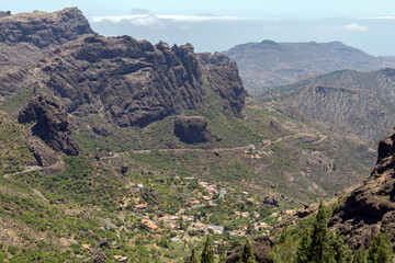 Fototapeta na wymiar A mountain village in Gran Canaria view from the rocks of Roque Nublo