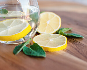 a glass of water with lemon