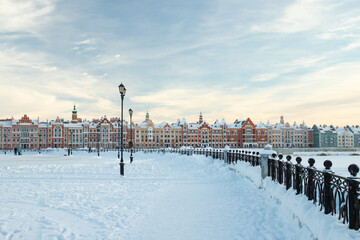 Fototapeta premium Architecture Of Houses On Bruges Embankment In Winter In Yoshkar-Ola, Russia.