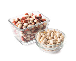 Bowls with raw beans on white background
