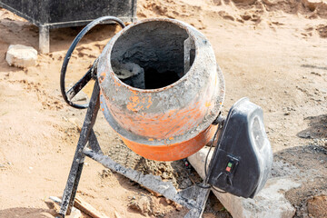 Industrial concrete mixer at a construction site. Preparation of concrete and mortar.