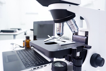 Cropped shot view of the equipment and science experiments in Laboratory, Chemical substances
for research and analyzing a sample under the microscope in laboratory.