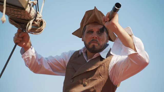 Portrait of man in a pirate costume on a pirate ship