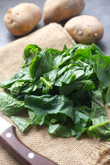 Fresh spinach leaves on table ,