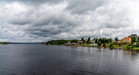 Fototapeta na wymiar view of the small town of Stromsund on the Stroms Vattudal Lake in northern Sweden