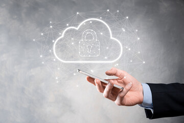 Business man hold,holding cloud computing data and security on global networking,Padlock and cloud icon. Technology of business.Cybersecurity and information or network protection.internet project