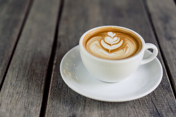 Latte art coffee in a white mug