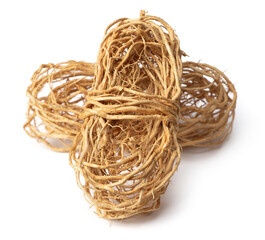 Obraz premium bunch of dried vetiver roots isolated on white background