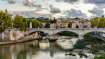 Fototapeta premium A bridge on the river Tiber at sunset in Rome, Italy