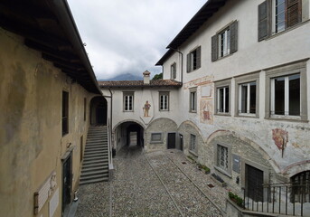 Fototapeta na wymiar Historic buiding and courtyard of the municipaly of Clusone, Lombardy, Italy