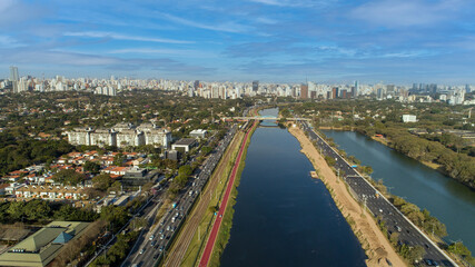 Obraz premium View of Marginal Pinheiros with the Pinheiros river and modern buildings in Sao Paulo, Brazil