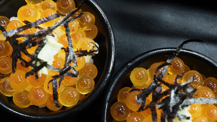 Ikura roe. Salmon Ikura Roe Served with rice and top with japanese Seaweed. Ikura don very famous menu in Hokkaido Japan. Most Served in hotel buffet breakfast. salmon roe or red caviar. Japanese food