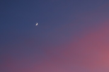 Photo of the moon at sunset