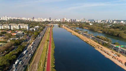 Fototapeta premium View of Marginal Pinheiros with the Pinheiros river and modern buildings in Sao Paulo, Brazil