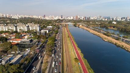 Fototapeta premium View of Marginal Pinheiros with the Pinheiros river and modern buildings in Sao Paulo, Brazil