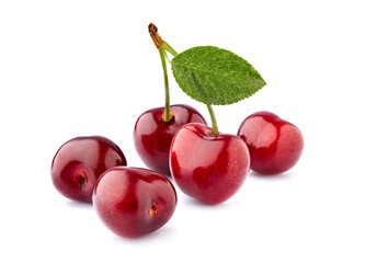 Sweet cherries  isolated on white background cutout. Ripe berries with leaf closeup.