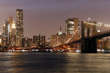 Naklejka na ściany i meble New York skyline from Brooklyn bridge park