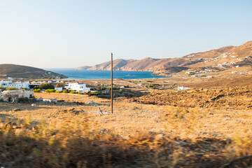 On the road, visiting Mykonos Island on a scooter in Greece