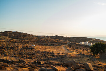 On the road, visiting Mykonos Island on a scooter in Greece