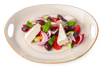 Greek salad in plate isolated on white