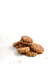 oatmeal cookies with cereals on a white background