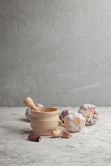 Organic Garlic. Fresh Garlic Cloves and Garlic bulb on  background with Pile of garlic or spice. Selected focus. Concept of spices for healthy cooking.