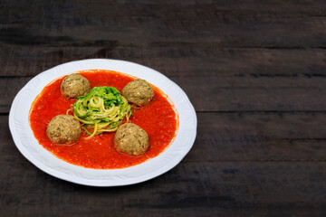 Brazilian meal of low carb food, healthy food of pasta and meatballs with space for text