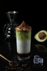 a ice dalgona coffee with avocado juice and fresh milk