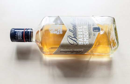 MOSCOW, RUSSIA - JUNE 10, 2021: open bottle of Ballantine's Barrel Smooth whisky. Ballantine's Scotch whisky was introduced 1827, today this brand belong to Pernod Ricard