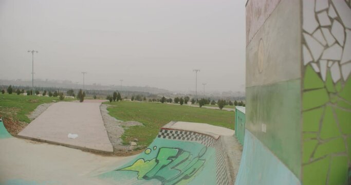 Skateboarders Carve A Quarter Pipe At The Suli Skate Park in Sulaymaniyah, Iraq