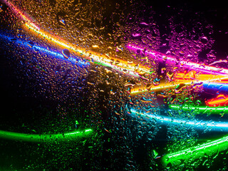 Misted glass, colorful abstract rainbow colored mist rain drops dew drops water droplets...