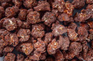 Gourmet sweet popcorn in close-up photo. Chocolate flavor. Top view