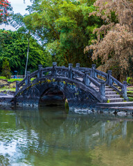 Footbridge, Across Waihonu Pond at of Liliuokalani Park and Gardens on The Waiakea Peninsula Near Downtown Hilo, Hawaii Island, Hawaii, USA