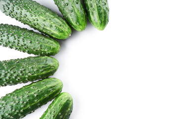 Set of fresh whole cucumbers on white background, food pattern. Garden cucumber wallpaper backdrop design