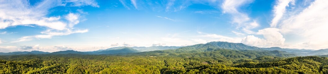 Aerial panorama of the Great Smoky Mountains National Park, as viewed from Gatlinburg, Tennessee. Cliff Top and Mount Le Conte on the right, and mount Chapman on the left dominate the massif.
