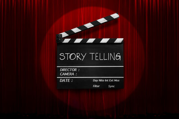 story telling ,text title on movie Clapper board or film slate and theatre curtains background.