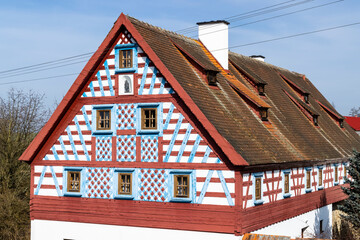 Half-timbered farmhouse, folk architecture in Milhostov, Western Bohemia, Czech Republic