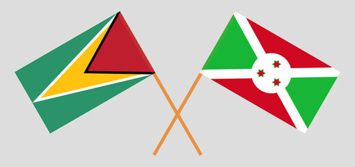 Crossed flags of Guyana and Burundi. Official colors. Correct proportion