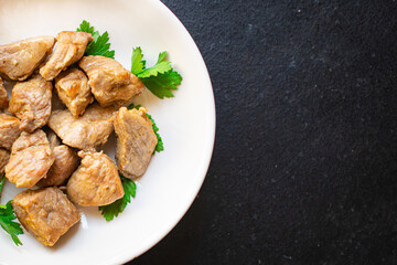 stewed meat ragout roast pork, lamb or turkey nutritious food organic products meal snack copy space food background rustic. top view keto or paleo diet