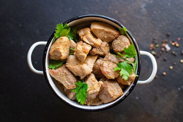stewed meat ragout roast pork, lamb or turkey nutritious food organic products meal snack copy space food background rustic. top view keto or paleo diet