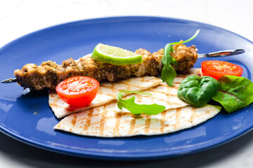Greek skewers of chicken with oregano
