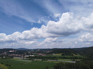 Panorama aerial view of Germany in Bavaria in summer with forest and meadow in the Danube region