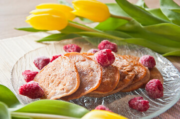 banana pies decorated with frozen raspberries