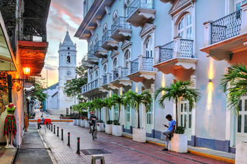 Avenida Central in Casco Viejo, Panama with Santa Maria La Antigua - Metropolitan Cathedral - in the background at sunset - obrazy, fototapety, plakaty