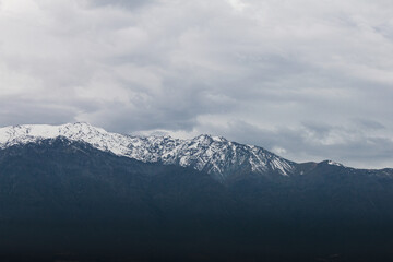 Fototapeta na wymiar Mountain top covered in snow in Santiago, Chile