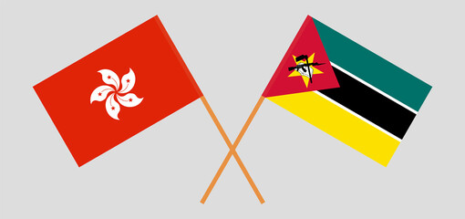 Crossed flags of Hong Kong and Mozambique. Official colors. Correct proportion